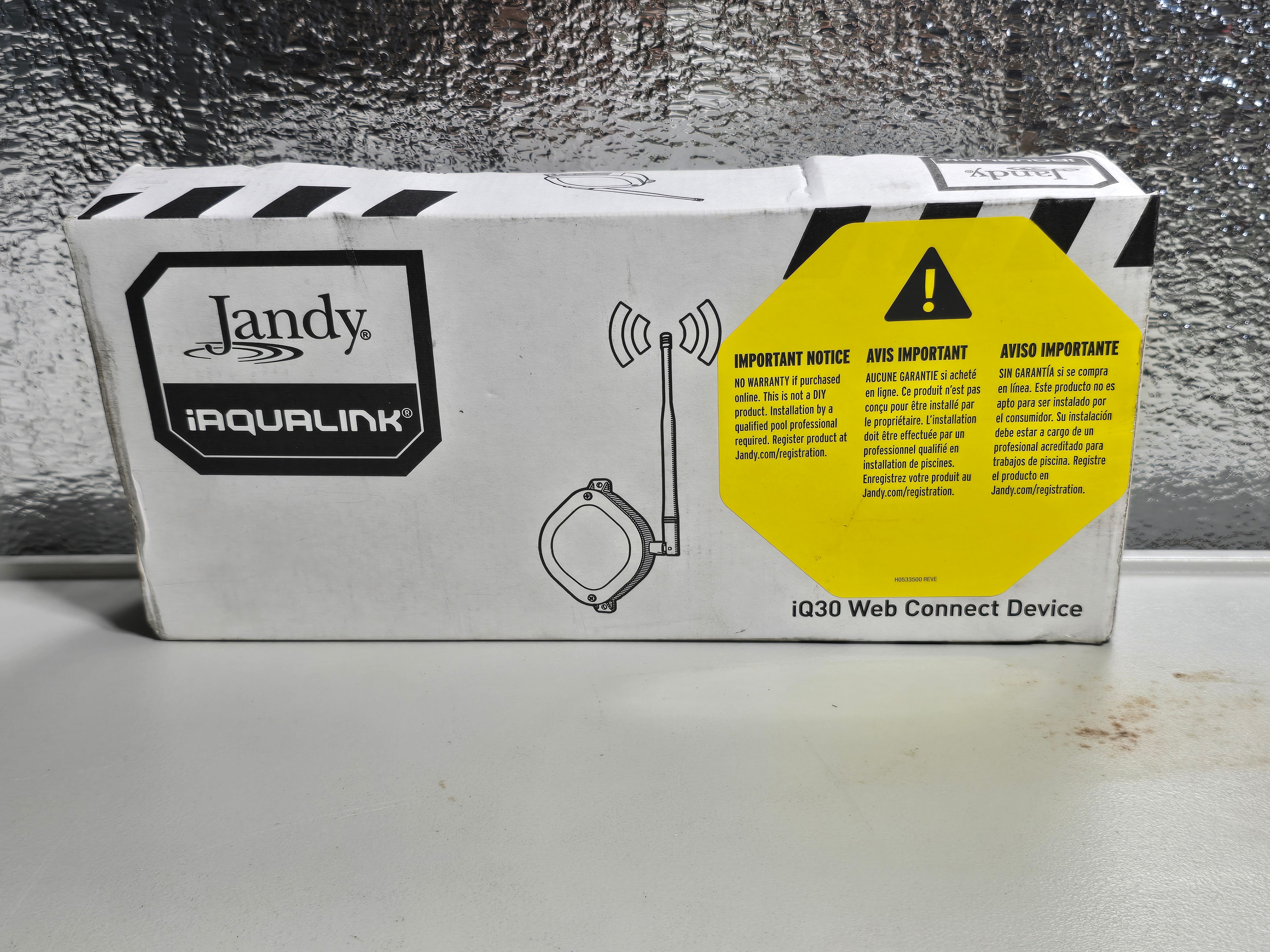 Jandy iAqualink iQ30 web connect device box — front view with important warranty notice