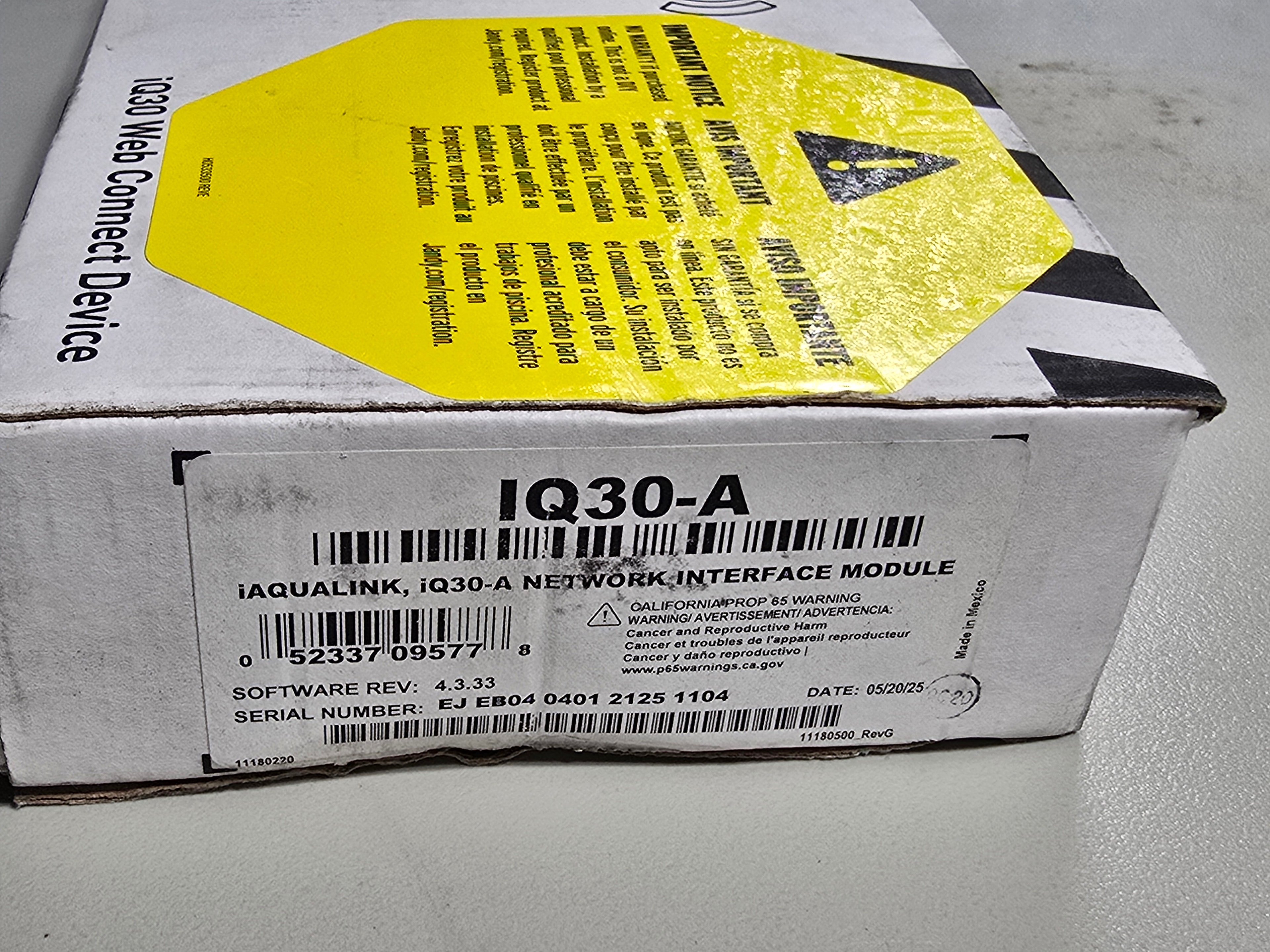 Jandy iQ30-A network interface module box label — model, UPC, serial number, software rev 4.3.33