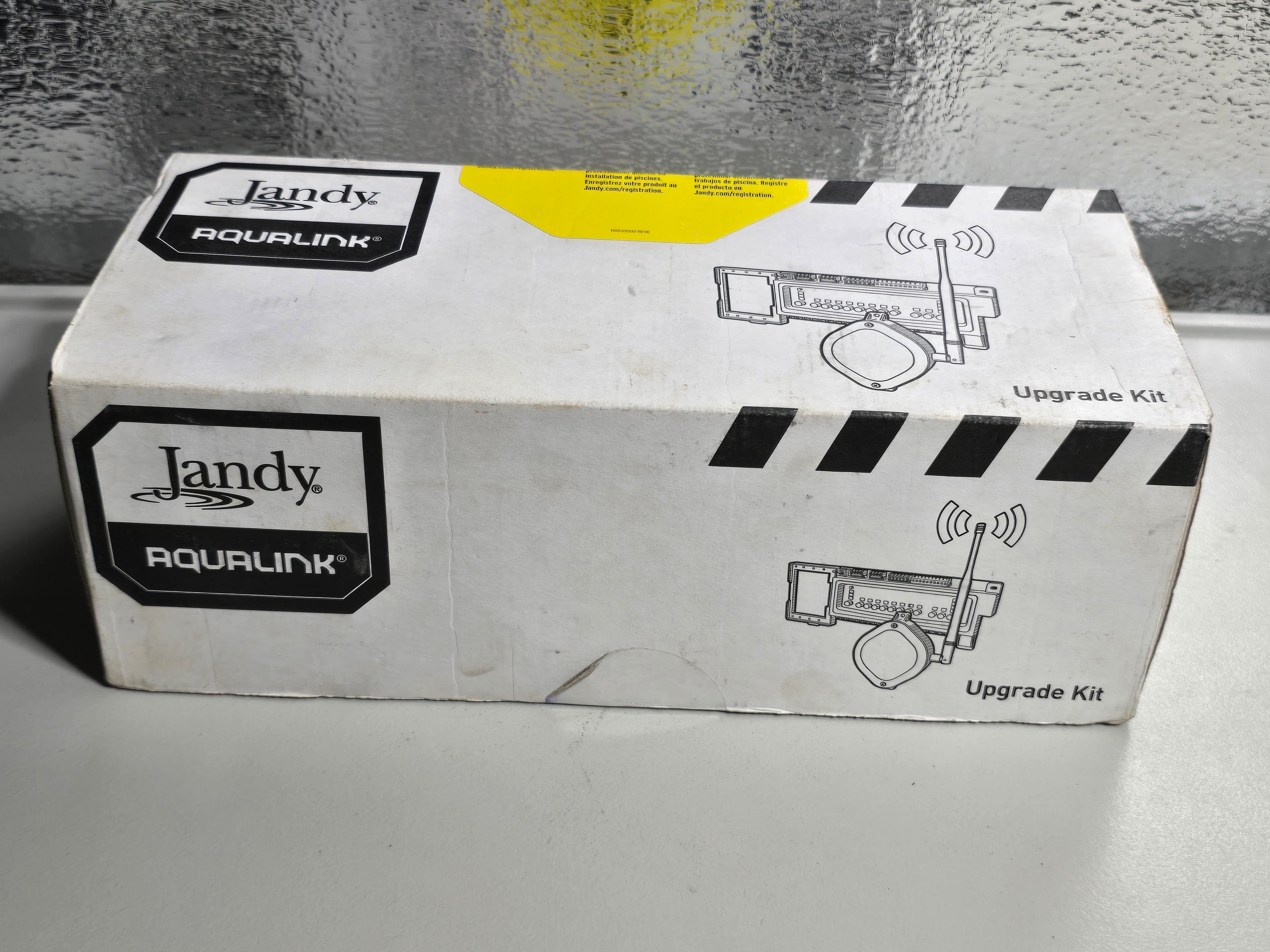 Jandy iAqualink IQ30-RS kit contents — all components laid out including PCB boards and antenna