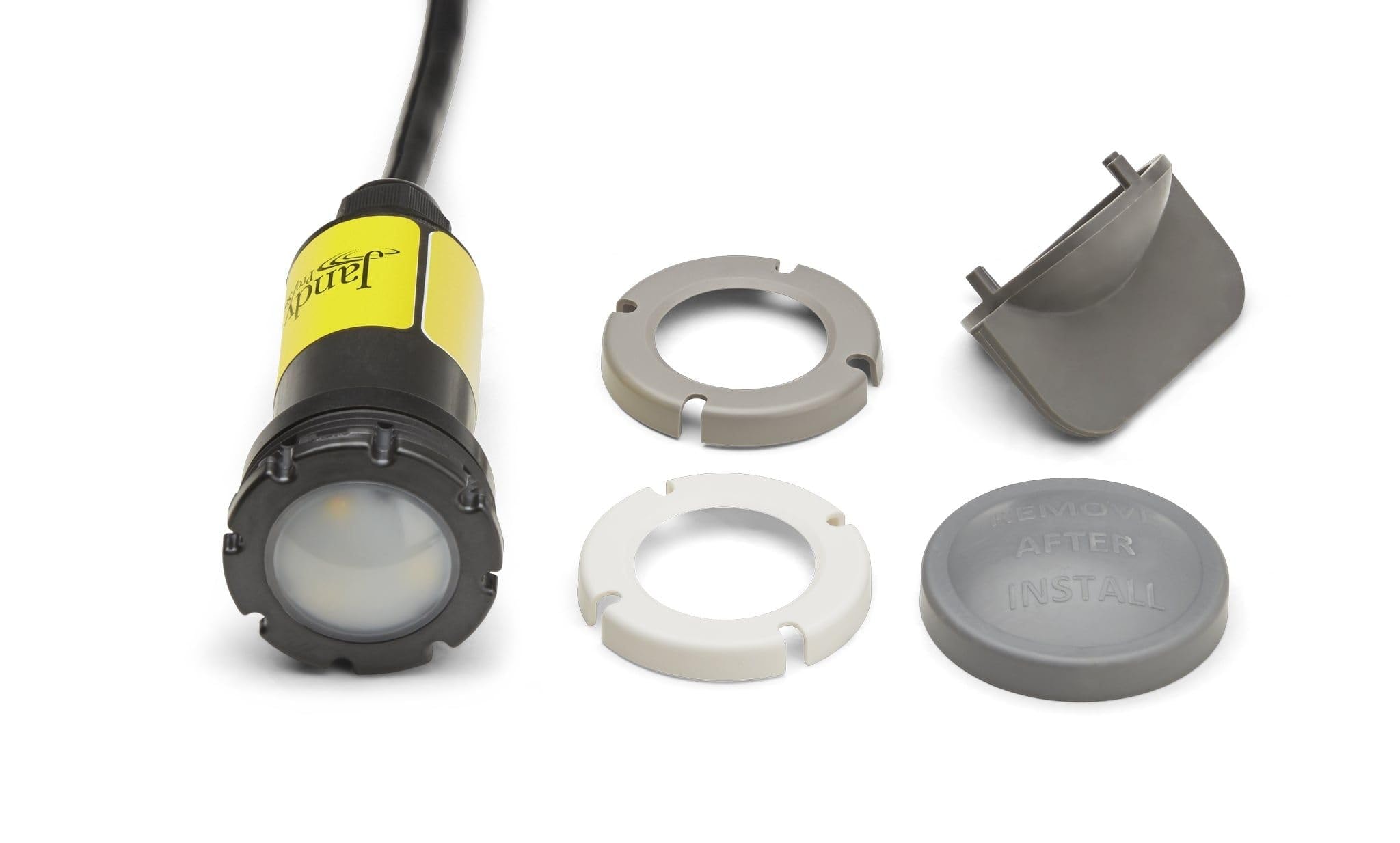 Jandy WaterColors LED light with interchangeable components — mounting rings and installation cap