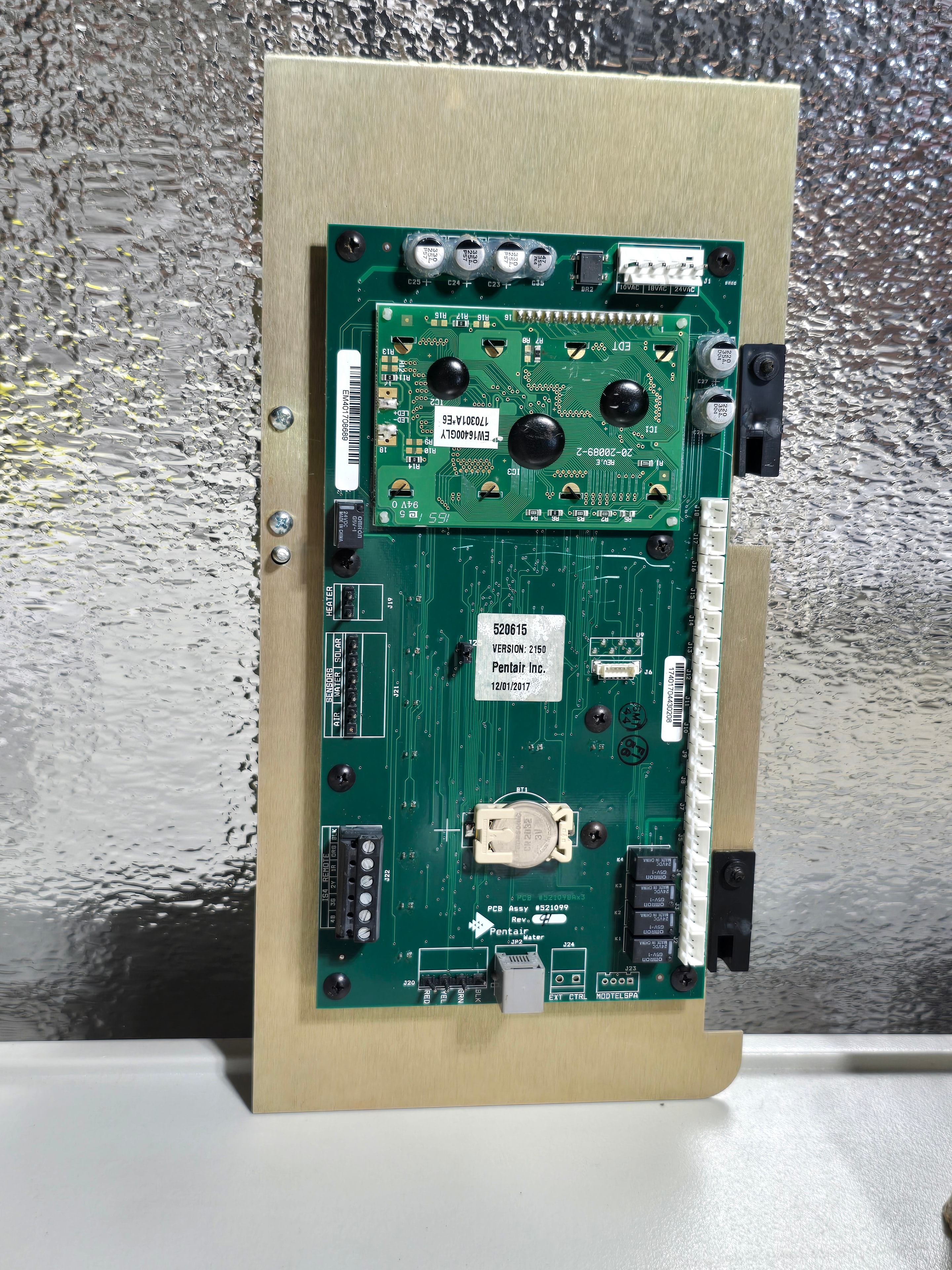Pentair ComPool 521107 PCB circuit board assembly (520615, Version 2150) mounted on tan backing plate