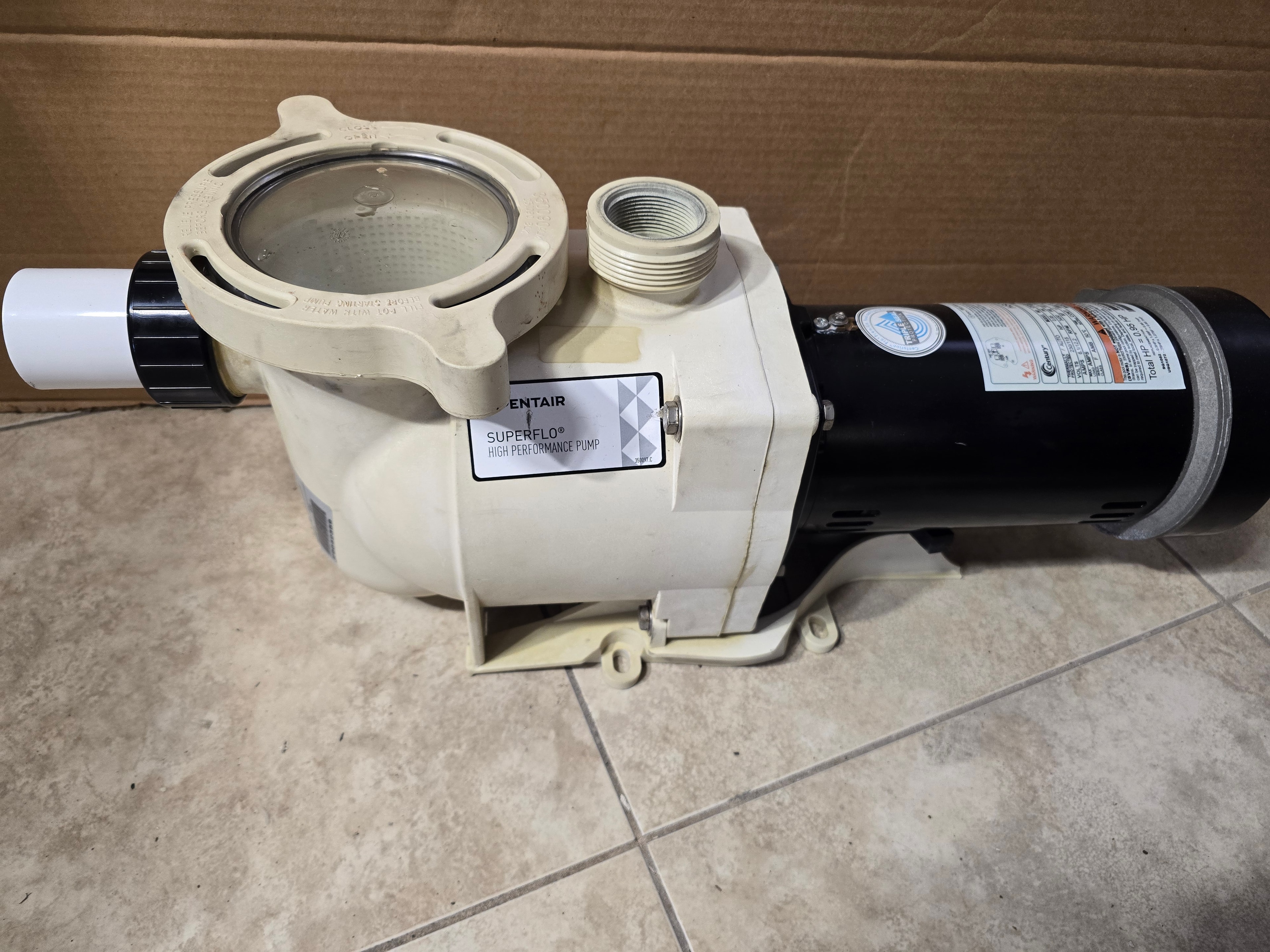 Pentair SuperFlo pump front view — strainer lid and inlet port